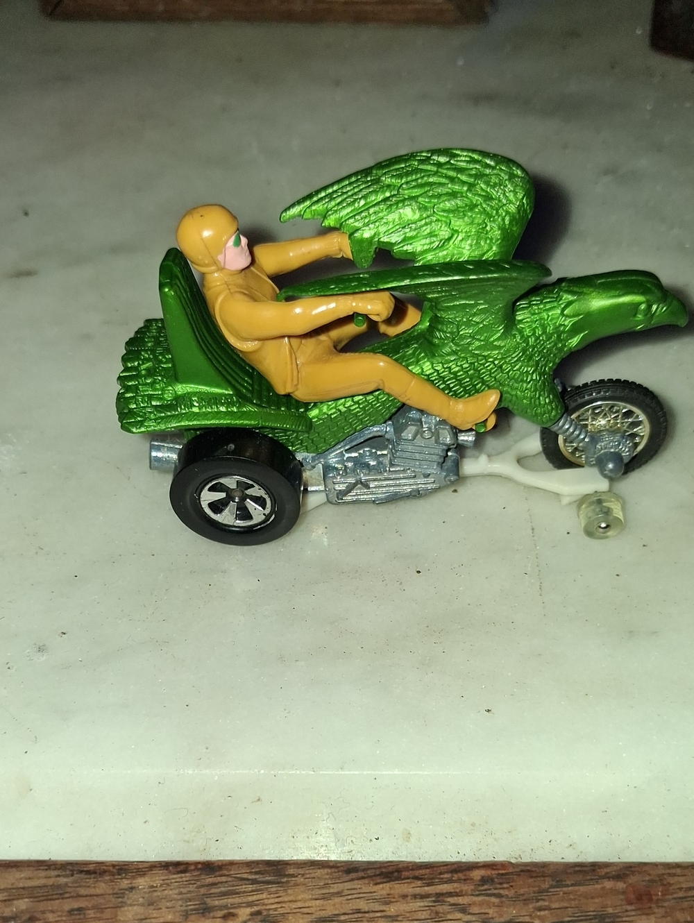 Vintage 1970s Hotwheels Metallic Green Eagle Motorcycle with Yellow Rider Figure